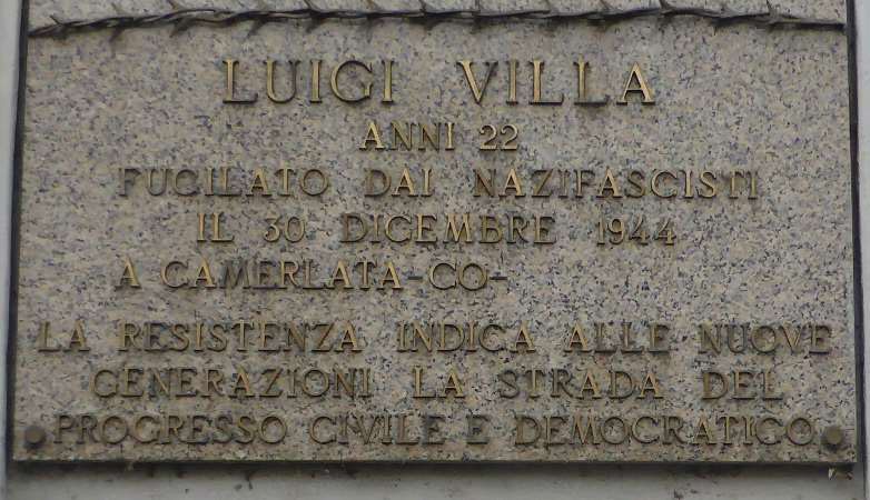 Lapide commemorativa di Luigi Villa, fucilato dai nazifascisti nel 1944 a Camerlata. Rappresenta un'importante memoria storica.