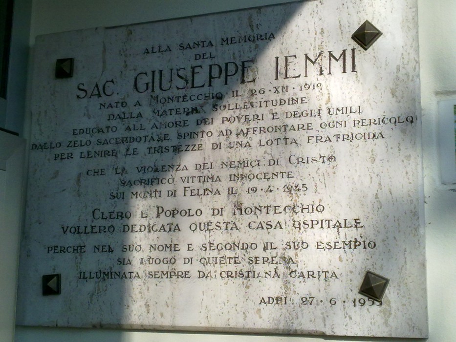 Lapide commemorativa dedicata a Giuseppe Iemmi a Montecchio, con messaggi di gratitudine e fede.