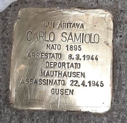 Pietra d'inciampo in memoria di Carlo Samiolo, vittima dell'olocausto, installata per ricordare la sua storia.