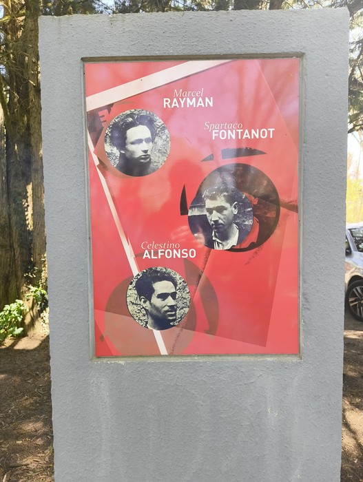 Memoriale del Gruppo Manouchian con ritratti di Marcel Rayman, Spartaco Fontanot e Celestino Alfonso.
