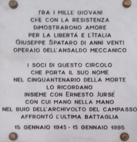 Lapide commemorativa in onore di Giuseppe Spataro e Ernesto Jursè, simbolo di resistenza e amore per la libertà.